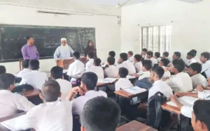 Comilla Crime News - MP Monirul Haque Chowdhury visited a school in Comilla and took classes himself