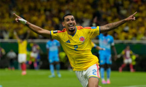 Munoz's lone goal sends Colombia into knockout phase